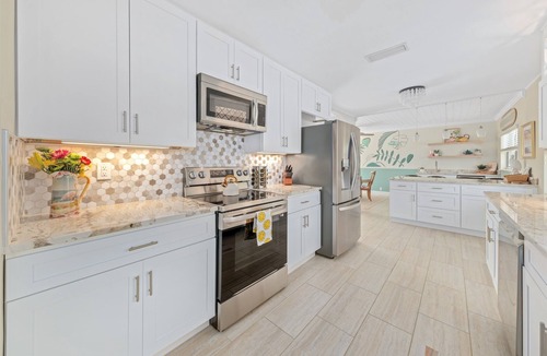 Cocoa Beach House | Waterfront Pool + Dock | Walk to Beach & Downtown | Family & Dog Friendly