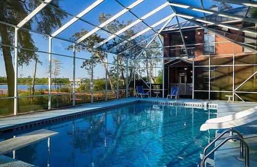 Freeport Apartment | Waterfront Property w/Pool & Dock