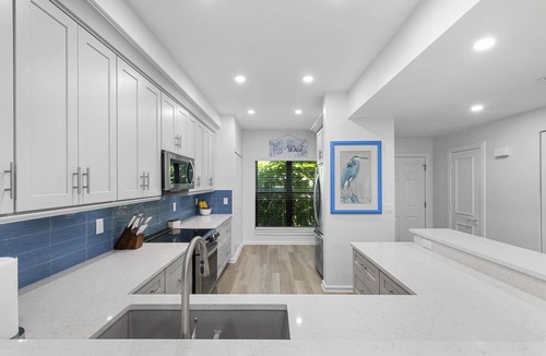 Isles of Capri Condo | Waterfront relaxation in a beautifully updated large condo!