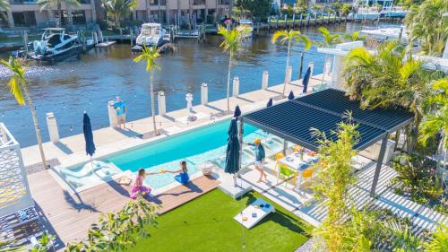 Coral Ridge House | Waterfront Residence Heated Pool grand outdoor Lime Key
