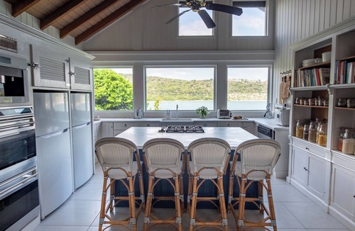 Liberta Villa | Waterfront Spacious 5-bedroom villa in Mamora Bay,Watersports Games room,
