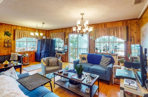 Fort Gaines House | Waterfront stay with boat launch, private beach, wrap-around deck, & grill