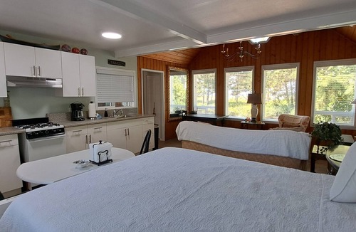Lincoln City Cottage | Waterfront studio cottage...just steps to the sandy shoreline of the Siletz Bay