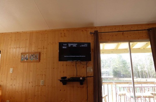 Roebuck RV Rental | Waterfront Tiny House at Pine Ridge Campground. More info in description.