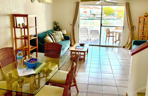 Jolly Harbour Villa | Waterfront two bed villa 3 mins walk to stunning Beach, air con and balcony
