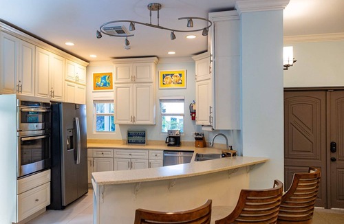 Leeward Settlement House | Waterfront Villa Dock & Pool Near Grace Bay