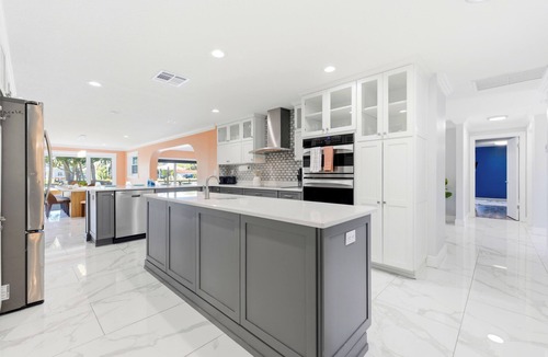 Largo House | Waterfront Villa! Heated Pool, Paddle Boards, and Game Room, Sleeps 20!