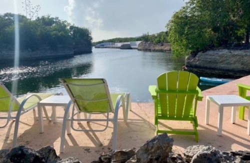 Cooper Jack Bay Settlement Villa | Waterfront Villa with Dockside Patio, Paddleboards & Pontoon Boat Rental option