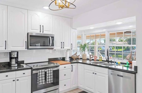 Cypress Lakes Villa | Waterfront Villa w/View, Heated Pool & Boat Rental