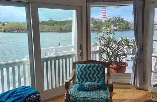 Lubbers Quarters Cay Villa | WATERFRONT VILLA with deck to enjoy the scenic views & historical lighthouse.