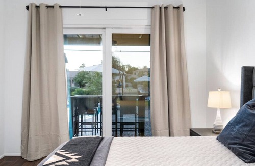 Fox Crossing Villa | Waterfront Villa with Pool Hot Tub and Lounge area