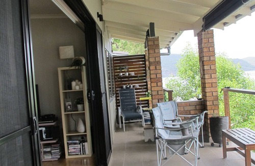 Little Wobby House | Waterfront with private jetty and sunset views. Boat access only. Pet friendly.