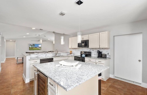 Palm Harbor House | Waterside Pool Paradise