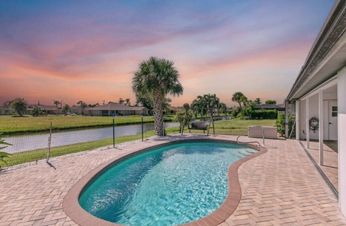 Pebble Beach House | Waterside Villa! Family Home! Pool! BBQ! Fishing
