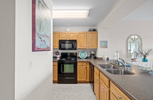 Waterside Village Condo | Waterside Village 408 - Stunning Gulf Views, Pool + Day Dock - Summer SALE!