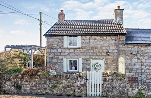 Bryncethin Cottage | Welcome to Shepherds Cottage by Happy Days Stays. A charming 200-year-old stone cottage with a king-size bed, enclosed garden, private parking and dog-friendly welcome, close to beaches, countryside and local attractions.