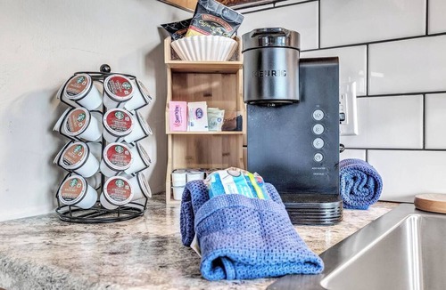 Algoma Apartment | Welcome to The Steele Magnolia! Completely renovated 2 bed/1ba plus bonus pull out futon couch. We are located directly across the street from Von Stiehl Winery and are just a few minutes walk to Crescent Beach!