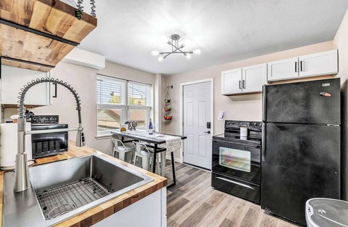 Algoma Apartment | Welcome to The Steele Magnolia! Completely renovated 2 bed/1ba plus bonus futon couch. We are located directly across the street from Von Stiehl Winery and are just a few minutes walk to Crescent Beach!