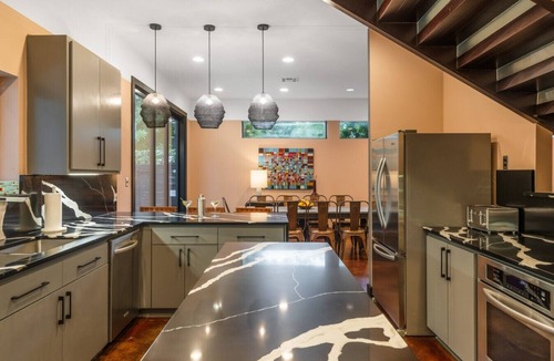 Zilker House | Welcome to your ultimate large-group retreat! Whether you’re celebrating a reunion, a weekend getaway, or a special occasion — this spacious 8-bedroom home comfortably sleeps up to 16 guests, combining comfort, fun and convenience all in one place.