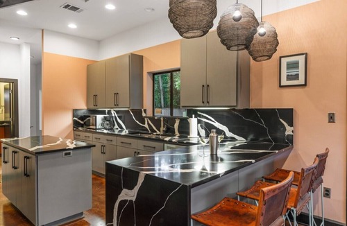 Zilker House | Welcome to your ultimate large-group retreat! Whether you’re celebrating a reunion, a weekend getaway, or a special occasion — this spacious 8-bedroom home comfortably sleeps up to 16 guests, combining comfort, fun and convenience all in one place.