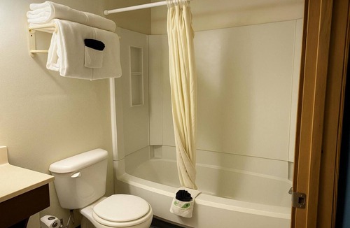 Wolf Point Hotel | Well-Equipped Classic Room Ideal for Families Traveling | Free Parking