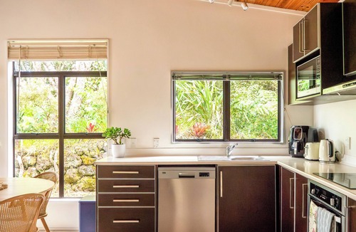 Paihia Cottage | Whimsical Chalet - perfectly formed quaint cottage surrounded by lush greenery