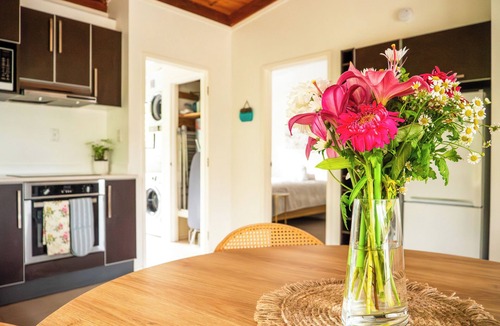 Paihia Cottage | Whimsical Chalet - perfectly formed quaint cottage surrounded by lush greenery