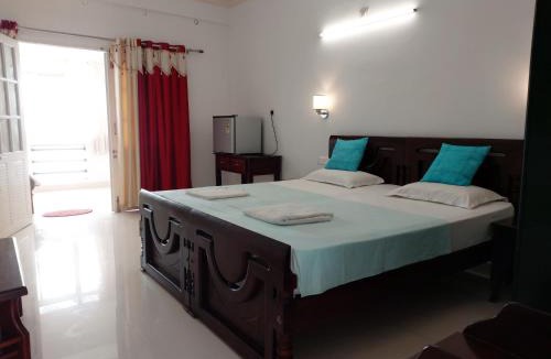 Neyyattinkara Hotel | White lounge beach resort
