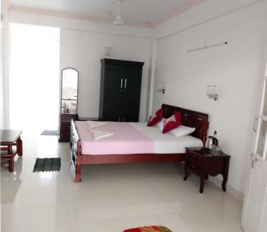 Neyyattinkara Hotel | White lounge beach resort