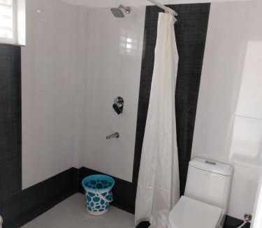 Neyyattinkara Hotel | White lounge beach resort