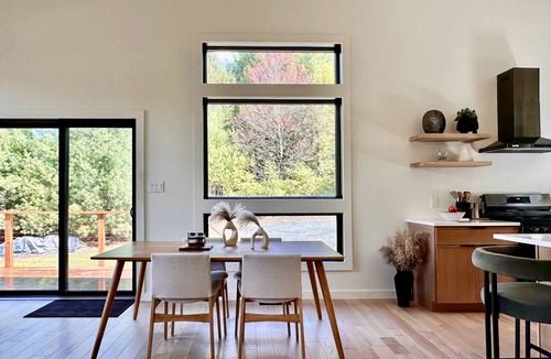 Barryville House | White Pine Chalet - Set among towering pines, this modern retreat pairs clean architecture with cozy interiors. Light-filled by day, serene and cocoon-like at night.