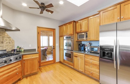 Whitewater House | Whitewater Lakefront Lodge with 200 Feet Shoreline Docks Sunset Views