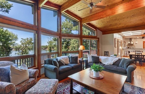 Whitewater House | Whitewater Lakefront Lodge with 200 Feet Shoreline Docks Sunset Views