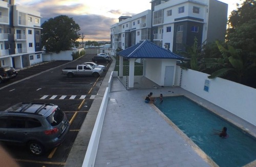 Moca Apartment | wifi, parking, Netflix, pool, ac, cable, terraza familiar.