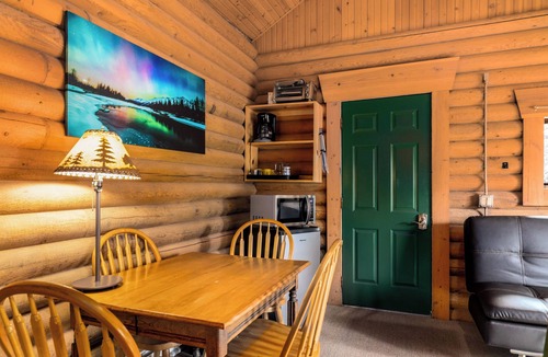 Bigfork Cabin | Wildflower Log Cabin with firepit & mountain views