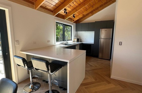 Pukawa House | Wildly inviting - Modern kiwi bach with Lake Taupo views