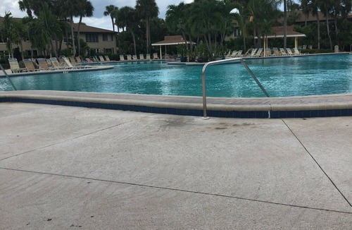 East Naples Condo | Winterpark Huge Pool 3 miles to beach.