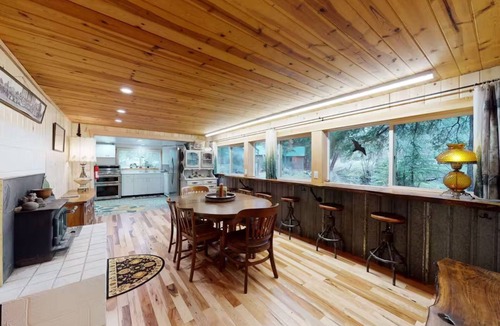 Enterprise Cabin | Wood Den rustic lake cabin, deck & mountain views