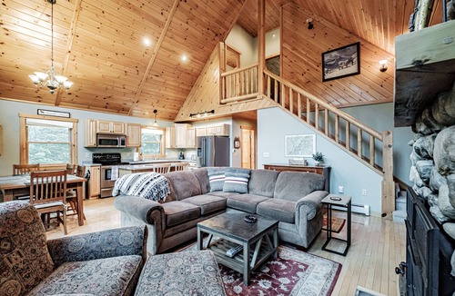 South Pond Shores Ski Chalet | Woodroad Chalet- Ski house close to water, Hot tub, large lot