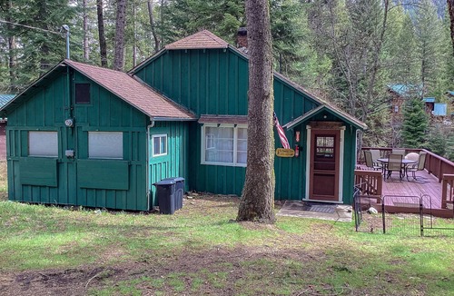 Joseph Cabin | Woodsy riverfront basecamp with fireplace, large deck & firepit - dogs welcome