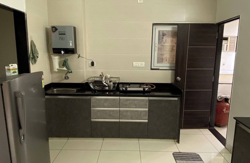 Vadodara Apartment | Work-Friendly 2BHK for Long Stays, Kitchen, Quiet Residential Area & Parking