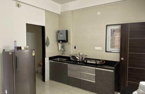 Vadodara Apartment | Work-Friendly 2BHK for Long Stays, Kitchen, Quiet Residential Area & Parking