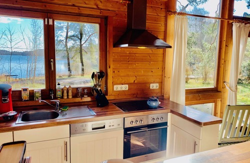 Rutenberg House | Your beautiful house on the lake with a fireplace, sauna and great lake view! With e-charging station