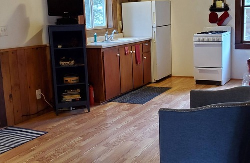 Eagle River Cottage | your own private beach Lakefront cozy cottage in a peaceful bay on 5 lake chain.