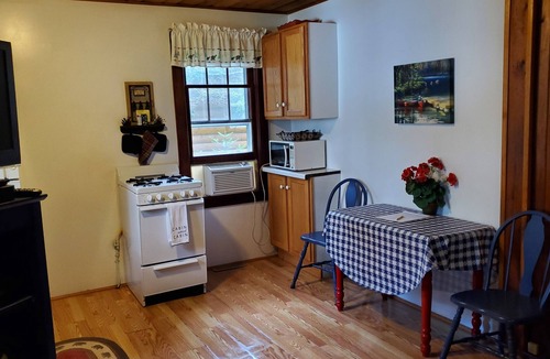 Eagle River Cottage | your own private beach Lakefront cozy cottage in a peaceful bay on 5 lake chain.