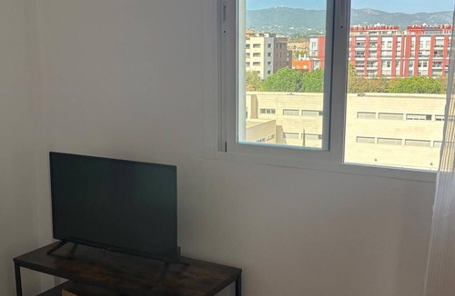 Centro Comercial Apartment | Your Sanctuary with a View of History: Live Córdoba from the Heart of the City