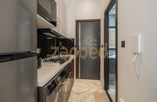 International City Apartment | Zapbed-Modern Studio Petalz By Danube