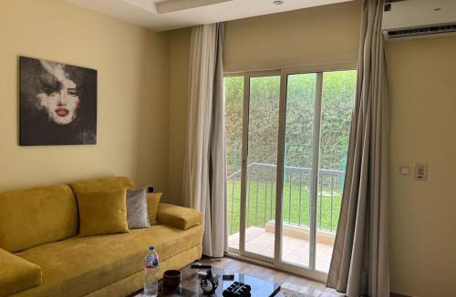 Sheikh Zayed City Apartment | Zayed Elite Retreat pool, garden & breeze