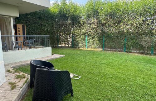 Sheikh Zayed City Apartment | Zayed Elite Retreat pool, garden & breeze