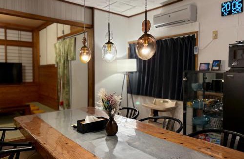 Nakama Ski Chalet | ZenAbode Onna 8 min walk to the beach BBQ in the large garden